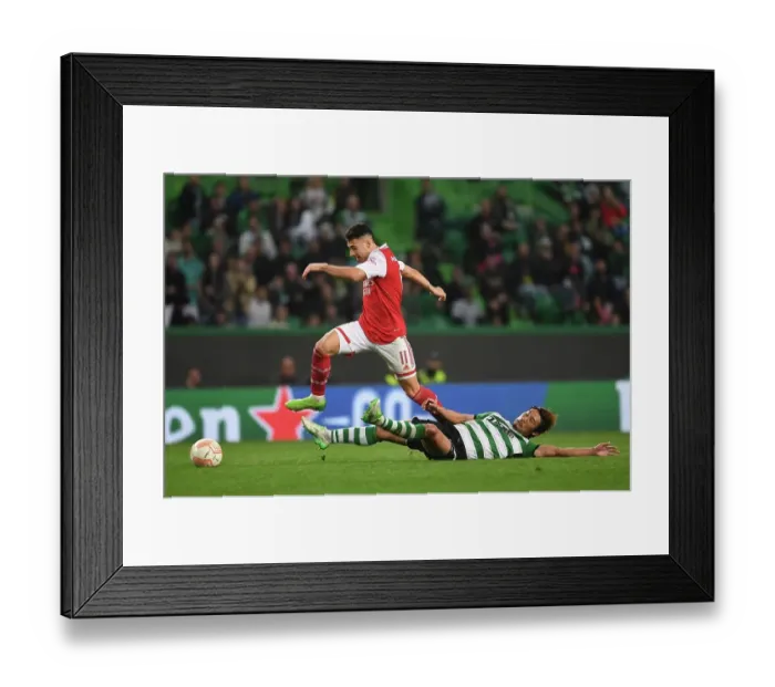 Framed Print : Gabriel Martinelli Breaks Past Sporting Defender in Europa League Clash: Arsenal vs. Sporting CP (March 2023) Framed Print : Gabriel Martinelli Breaks Past Sporting Defender in Europa League Clash: Arsenal vs. Sporting CP (March 2023)