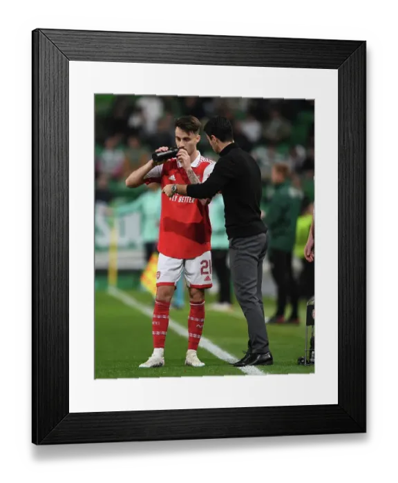 Framed Print : Arsenal Manager Mikel Arteta Conferencing with Sporting CP's Fabio Vieira during Europa League Clash
