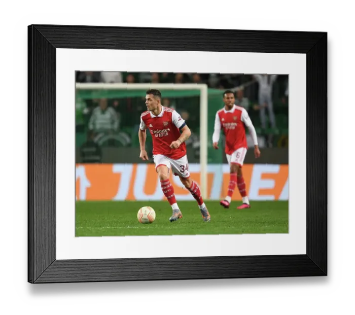 Framed Print : Granit Xhaka in Action: Arsenal's Europa League Battle against Sporting Lisbon, Portugal, 2022-23 Framed Print : Granit Xhaka in Action: Arsenal's Europa League Battle against Sporting Lisbon, Portugal, 2022-23