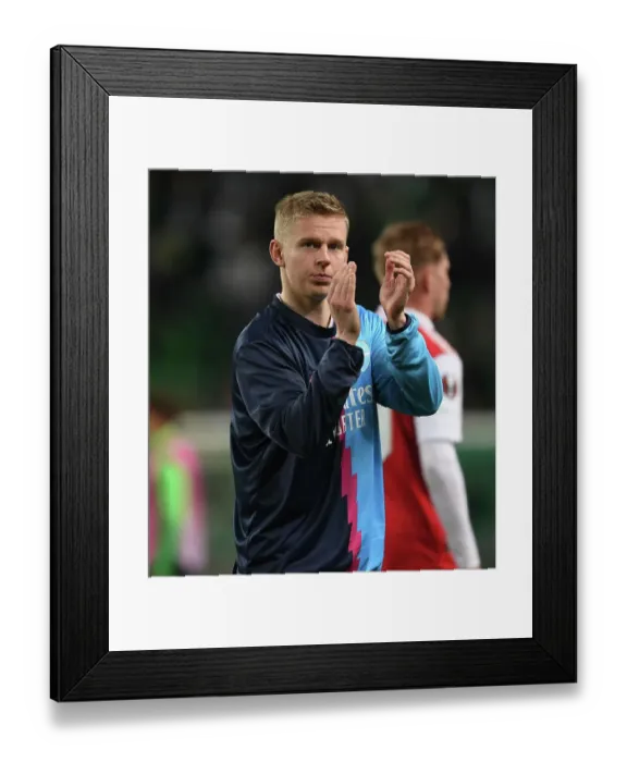 Framed Print : Arsenal's Oleksandr Zinchenko Celebrates Europa League Victory with Fans