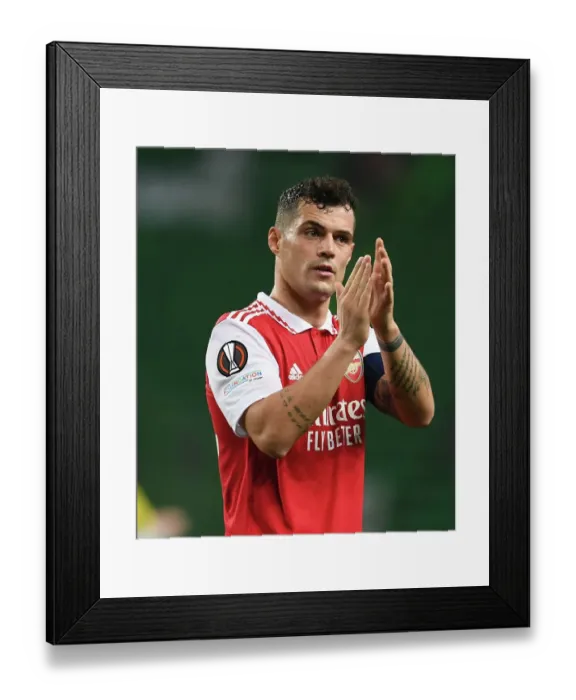Framed Print : Granit Xhaka's Heartfelt Applause: Arsenal's Europa League Victory Over Sporting CP (Round of 16, Leg One) Framed Print : Granit Xhaka's Heartfelt Applause: Arsenal's Europa League Victory Over Sporting CP (Round of 16, Leg One)