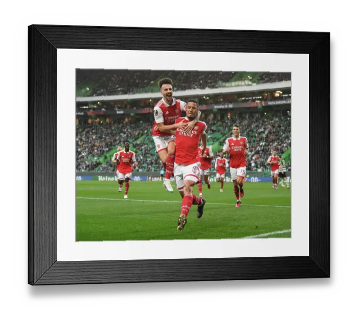 Framed Print : Saliba and Vieira's Europa League Goal Celebration: Arsenal's Unforgettable Moment in Lisbon