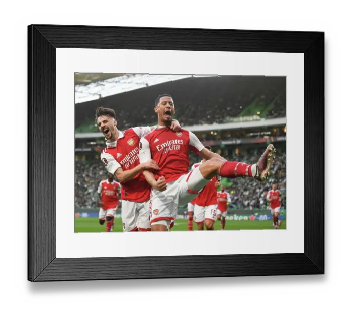 Framed Print : Arsenal's Saliba and Vieira: Celebrating Their First Goal in Europa League Victory over Sporting Lisbon
