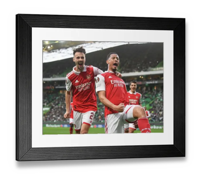 Framed Print : Arsenal's William Saliba and Fabio Vieira Celebrate Goal in Europa League Clash against Sporting Lisbon Framed Print : Arsenal's William Saliba and Fabio Vieira Celebrate Goal in Europa League Clash against Sporting Lisbon