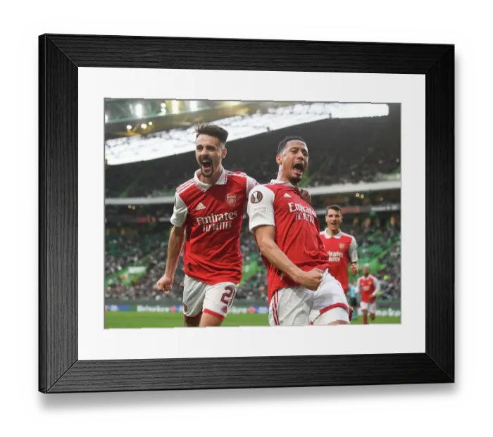 Framed Print : Saliba and Vieira's Historic First Goal: Arsenal's Europa League Victory Against Sporting Lisbon