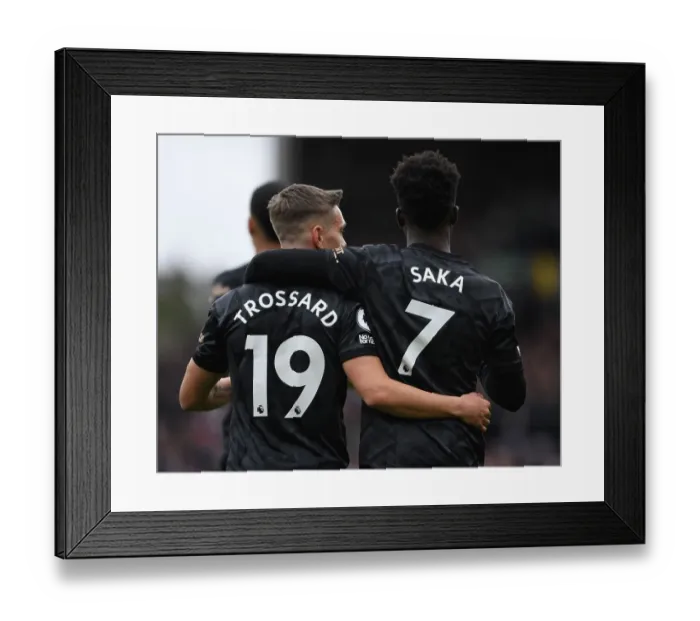 Framed Print : Arsenal's Saka and Trossard Clash Against Fulham in Premier League Showdown Framed Print : Arsenal's Saka and Trossard Clash Against Fulham in Premier League Showdown
