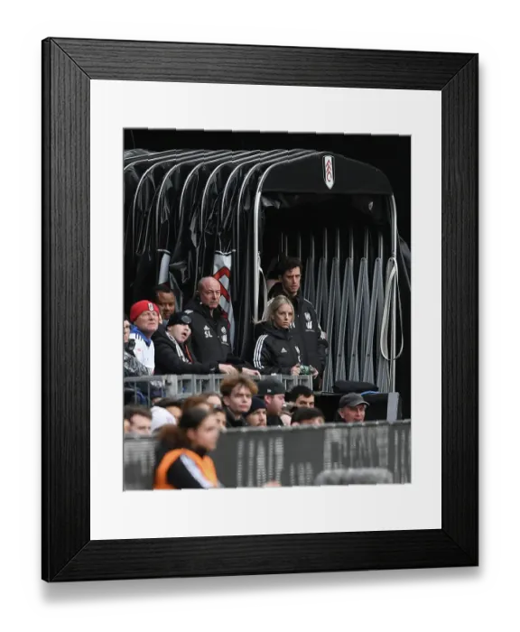 Framed Print : Fulham vs Arsenal: Tim Maynard Tends to Injured Player in Premier League Clash (2022-23)