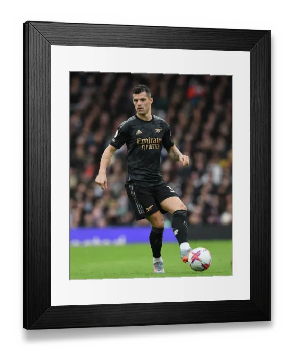 Framed Print : Granit Xhaka: Arsenal's Midfield Mastermind Dazzles in Fulham Showdown, Premier League 2022-23 Framed Print : Granit Xhaka: Arsenal's Midfield Mastermind Dazzles in Fulham Showdown, Premier League 2022-23