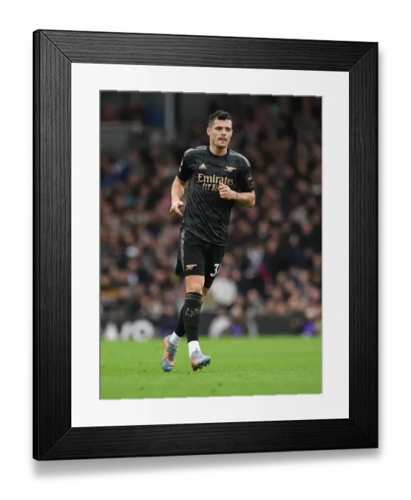 Framed Print : Granit Xhaka: Arsenal's Midfield Mastermind in Action against Fulham, Premier League 2022-23 Framed Print : Granit Xhaka: Arsenal's Midfield Mastermind in Action against Fulham, Premier League 2022-23