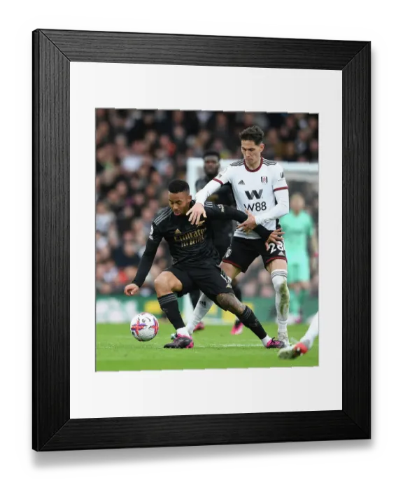 Framed Print : Gabriel Jesus vs Sasa Lukic: A Premier League Battle at Craven Cottage