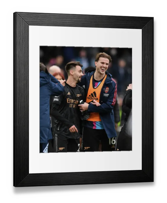 Framed Print : Arsenal's Holding and Vieira Celebrate Victory over Fulham in Premier League Clash