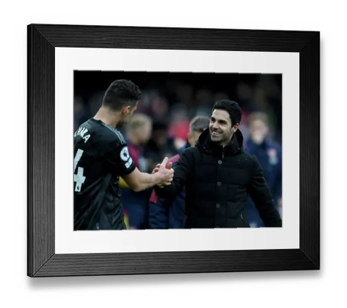 Framed Print : Arsenal's Winning Duo: Arteta and Xhaka Celebrate Premier League Victory over Fulham