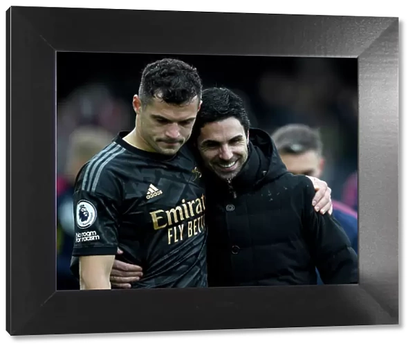 Arsenal Manager Mikel Arteta Celebrates with Granit Xhaka after Fulham Victory, 2022-23 Premier League