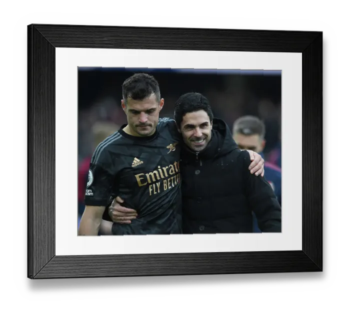 Framed Print : Mikel Arteta Consoles Granit Xhaka: Emotional Moment After Arsenal's Win Against Fulham (Fulham v Arsenal 2022-23)