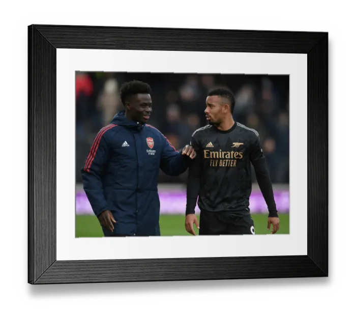 Framed Print : Arsenal's Bukayo Saka and Gabriel Jesus Celebrate Victory over Fulham in Premier League