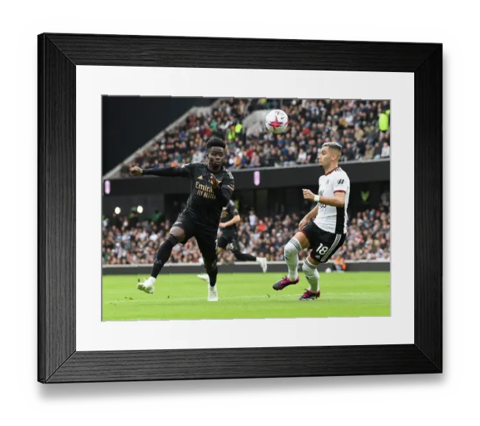 Framed Print : Saka vs Pereira: Battle at Craven Cottage - Fulham vs Arsenal, Premier League 2022-23