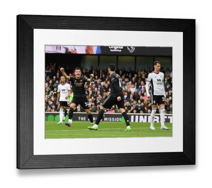 Framed Print : Martinelli and Xhaka Celebrate Arsenal's Winning Goal vs Fulham (2022-23)