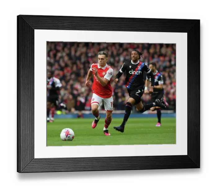 Framed Print : Intense Rivalry: Trossard vs. Olise Clash in Arsenal vs. Crystal Palace Premier League Showdown