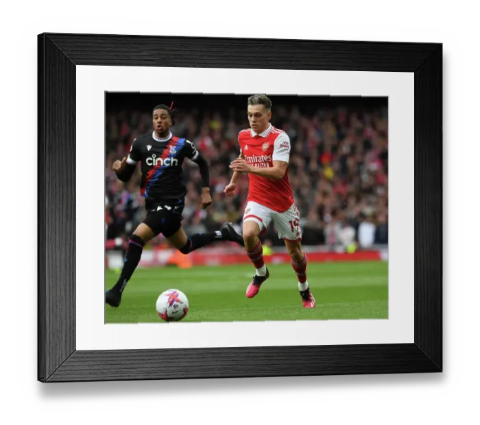 Framed Print : Arsenal's Trossard Shines in Premier League Clash Against Crystal Palace