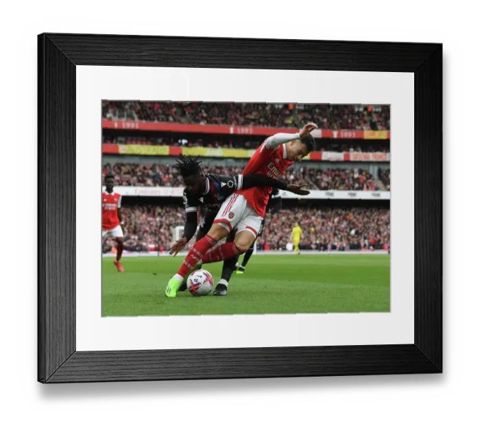 Framed Print : Martinelli vs. Schlupp: Intense Clash in Arsenal's Battle Against Crystal Palace Framed Print : Martinelli vs. Schlupp: Intense Clash in Arsenal's Battle Against Crystal Palace