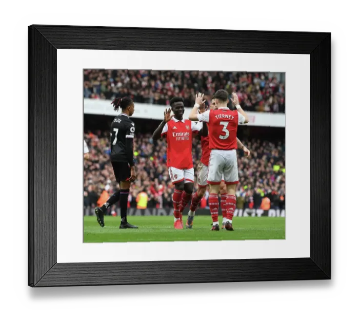 Framed Print : Arsenal's Saka and Tierney: Celebrating a Winning Goal Against Crystal Palace (2022-23)