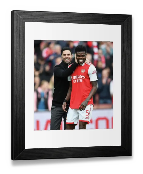 Framed Print : Arsenal's Victory: Mikel Arteta and Thomas Partey's Triumphant Moment (2022-23)