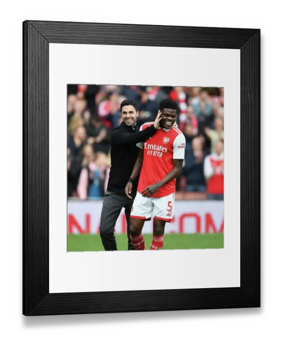 Framed Print : Arsenal's Victory: Mikel Arteta and Thomas Partey Celebrate Against Crystal Palace (2022-23) Framed Print : Arsenal's Victory: Mikel Arteta and Thomas Partey Celebrate Against Crystal Palace (2022-23)
