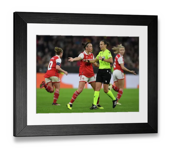 Framed Print : Arsenal's Caitlin Foord Disputes Ref's Decision in Women's Champions League Quarter-Final Clash Against Bayern Munich