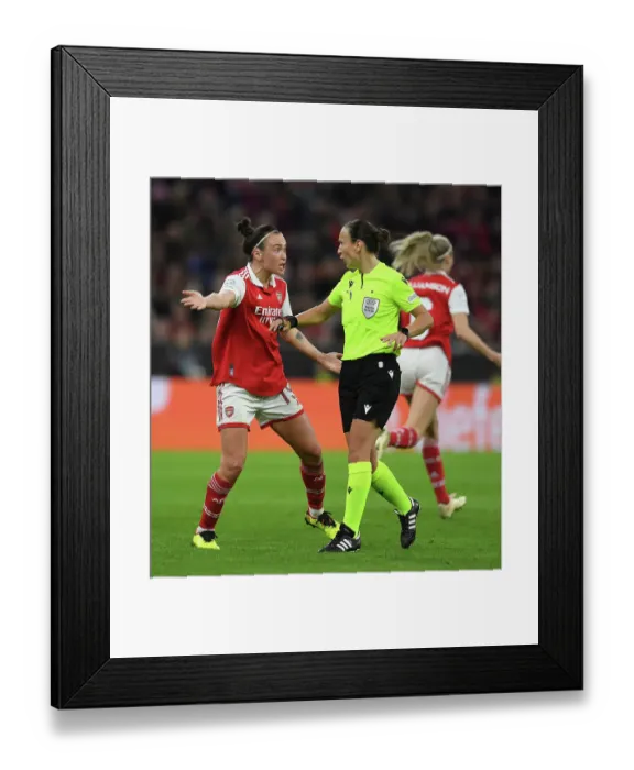 Framed Print : Arsenal's Caitlin Foord Contests Referee Decision in Women's Champions League Quarter-Final vs FC Bayern Munich