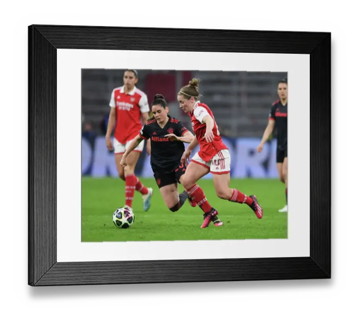 Framed Print : Arsenal vs. Bayern Munich: A Quarter-Final Battle in the Women's Champions League at Allianz Arena