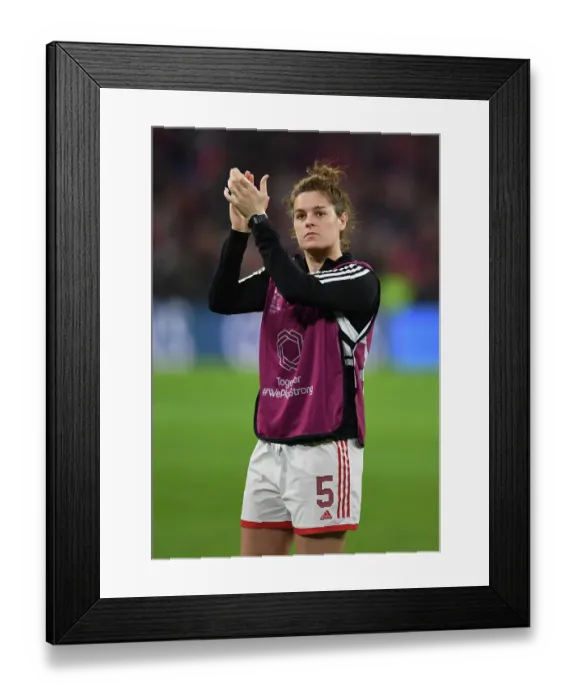 Framed Print : Arsenal vs. Bayern Munich: A Battle in the Women's Champions League Quarter-Finals at Allianz Arena