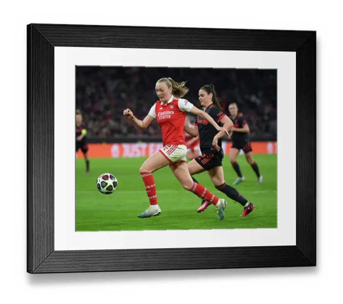 Framed Print : Arsenal vs. Bayern Munich: A Quarter-Final Battle in the UEFA Women's Champions League at Allianz Arena