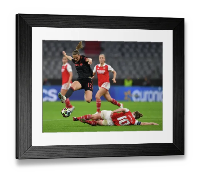 Framed Print : Arsenal vs. Bayern Munich: A Battle in the UEFA Women's Champions League Quarter-Finals