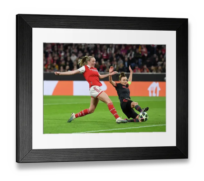 Framed Print : Arsenal's Frida Maanum Battles for Ball Control Against Bayern Munich in Women's Champions League Quarter-Final