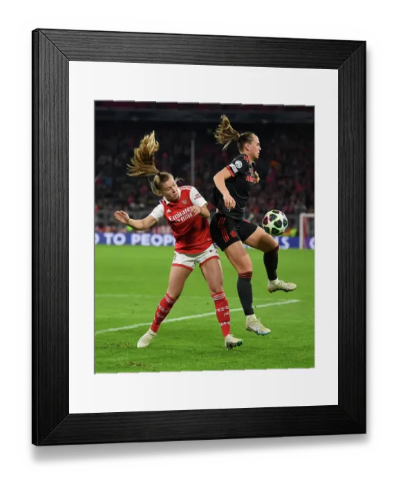 Framed Print : Arsenal vs. Bayern Munich: A Battle in the UEFA Women's Champions League Quarter-Finals
