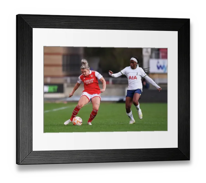 Framed Print : Arsenal's Laura Wienroither Battles it Out in Thrilling Arsenal vs. Tottenham Women's Super League Showdown