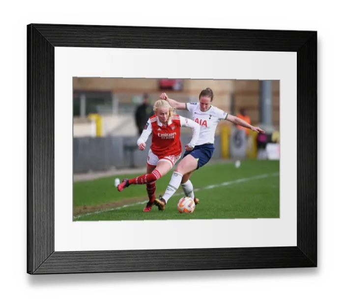 Framed Print : Tottenham Hotspur vs. Arsenal: Women's Super League Clash - Kathrine Kuhl Tackled by Kerys Harrop Framed Print : Tottenham Hotspur vs. Arsenal: Women's Super League Clash - Kathrine Kuhl Tackled by Kerys Harrop
