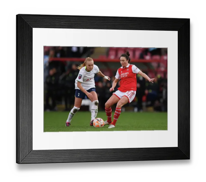 Framed Print : Tottenham vs Arsenal: Women's Super League Clash - Jodie Taylor Fights Past Opponent