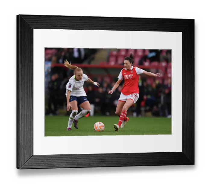 Framed Print : Tottenham vs Arsenal: Intense Battle in FA Women's Super League