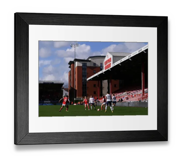 Framed Print : Intense Battle for Possession: Arsenal vs. Tottenham Women's Super League Showdown