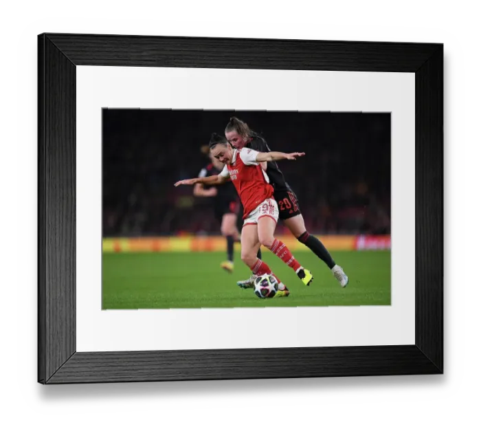 Framed Print : Arsenal vs. Bayern Munich: A Quarter-Final Battle in the Women's Champions League at Emirates Stadium
