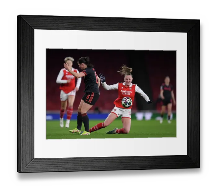 Framed Print : Arsenal vs Bayern Munich: A Battle in the Women's Champions League Quarter-Finals