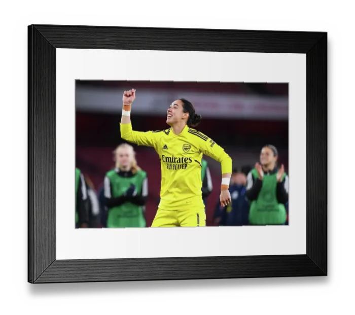 Framed Print : Arsenal Women's Historic UEFA Champions League Victory: Manuela Zinsberger Celebrates Over Bayern Munich