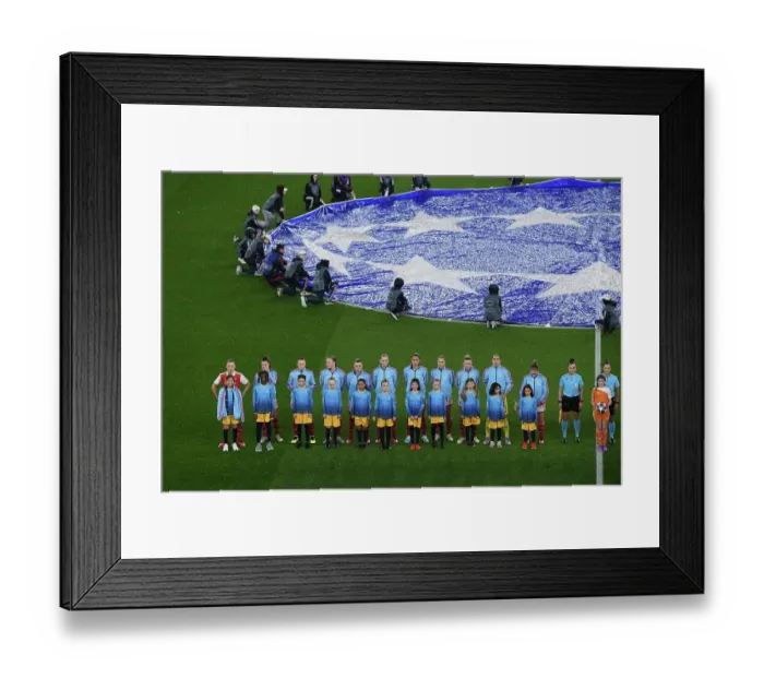 Framed Print : Arsenal vs. Bayern Munich: A Quarter-Final Battle in the Women's Champions League at Emirates Stadium