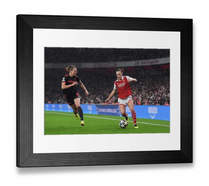 Framed Print : Arsenal vs. Bayern Munich: A Quarter-Final Showdown in the Women's Champions League at Emirates Stadium