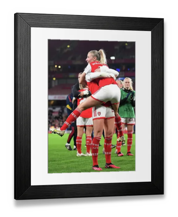 Framed Print : Arsenal Women's Historic Champions League Victory: Leah Williamson and Stina Blackstenius Embrace Triumph Over Bayern Munich