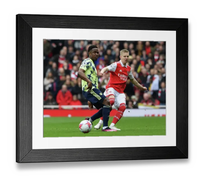 Framed Print : Arsenal vs Leeds United: Zinchenko Evades Pressure in Premier League Showdown