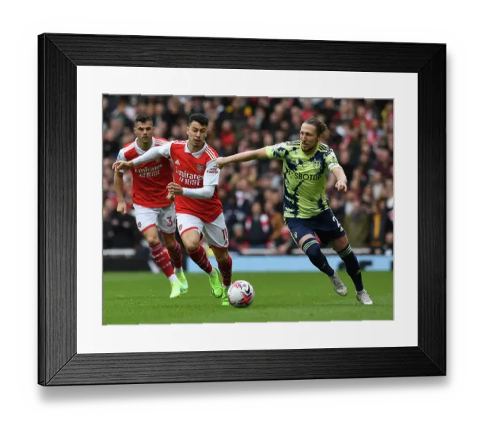 Framed Print : Arsenal's Martinelli Clashes with Leeds Ayling in Premier League Showdown Framed Print : Arsenal's Martinelli Clashes with Leeds Ayling in Premier League Showdown