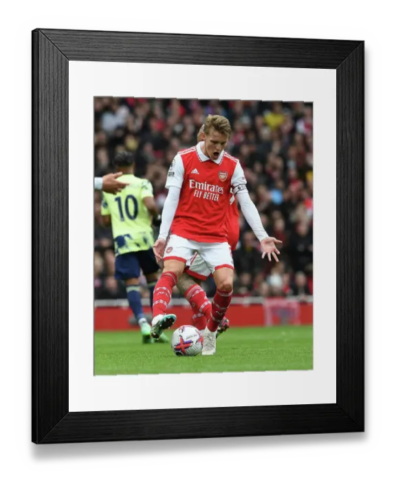 Framed Print : Martin Odegaard's Standout Display: Arsenal's Victory Against Leeds United (2022-23) Framed Print : Martin Odegaard's Standout Display: Arsenal's Victory Against Leeds United (2022-23)