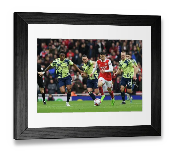 Framed Print : Arsenal vs Leeds United: Martinelli Takes on Harrison and Firpo in Premier League Showdown Framed Print : Arsenal vs Leeds United: Martinelli Takes on Harrison and Firpo in Premier League Showdown